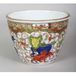 A CHINESE STYLE ENAMELLED PORCELAIN BOWL, decorated with panels of Kylin and of precious objects,