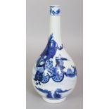 A CHINESE BLUE & WHITE PORCELAIN BOTTLE VASE, the sides decorated with a scene of an official in a