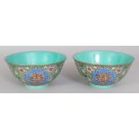 A PAIR OF CHINESE FAMILLE ROSE PORCELAIN BOWLS, the sides of each decorated with Shou medallions and