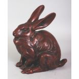 A JAPANESE BRONZE MODEL OF A RABBIT, possibly Taisho period, naturalistically cast, the base with