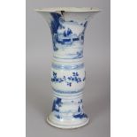 A CHINESE KANGXI PERIOD BLUE & WHITE PORCELAIN GU VASE, circa 1700, painted with river landscape