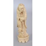 A CHINESE IVORY-STYLE FIGURE OF THE IMMORTAL LI TIEGUAI, leaning forward on his crutch, 5.25in