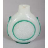 A CHINESE GREEN OVERLAY GLASS SNUFF BOTTLE, decorated with raised green plain borders reserved on an