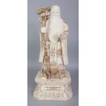 A LARGE CHINESE SECTIONAL BONE FIGURE OF SHOU LAO, standing on a chamfered square plinth and