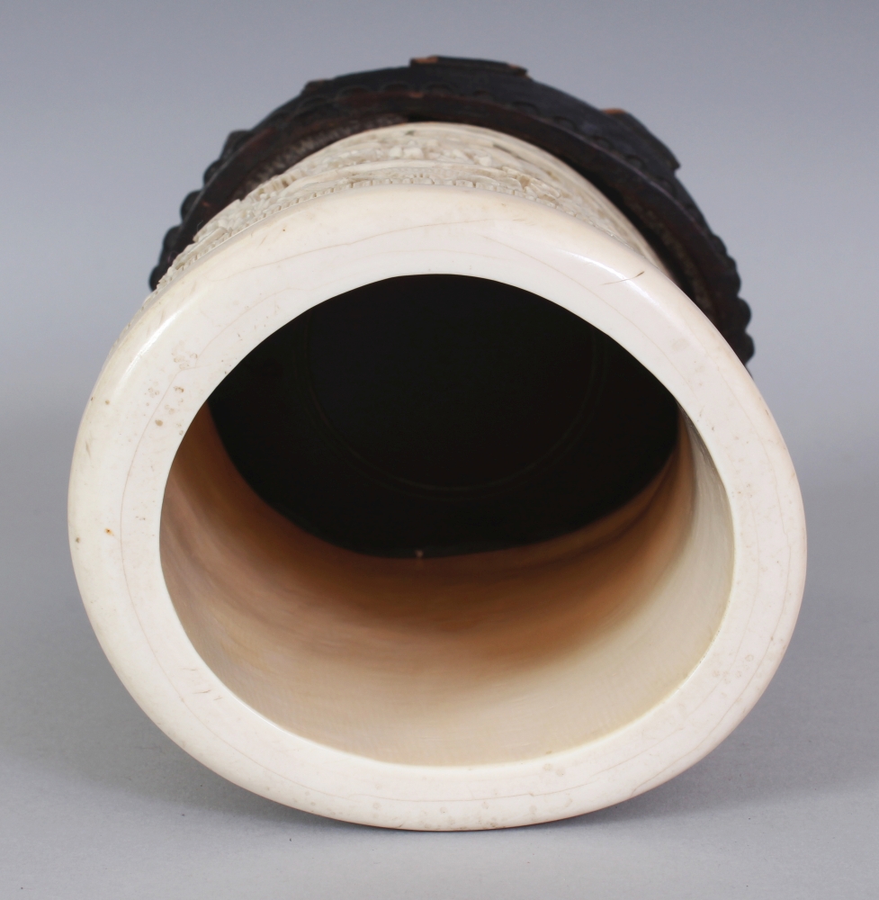 A GOOD LARGE 19TH CENTURY CHINESE CANTON IVORY BRUSHPOT, together with a fixed wood stand, the sides - Image 6 of 7