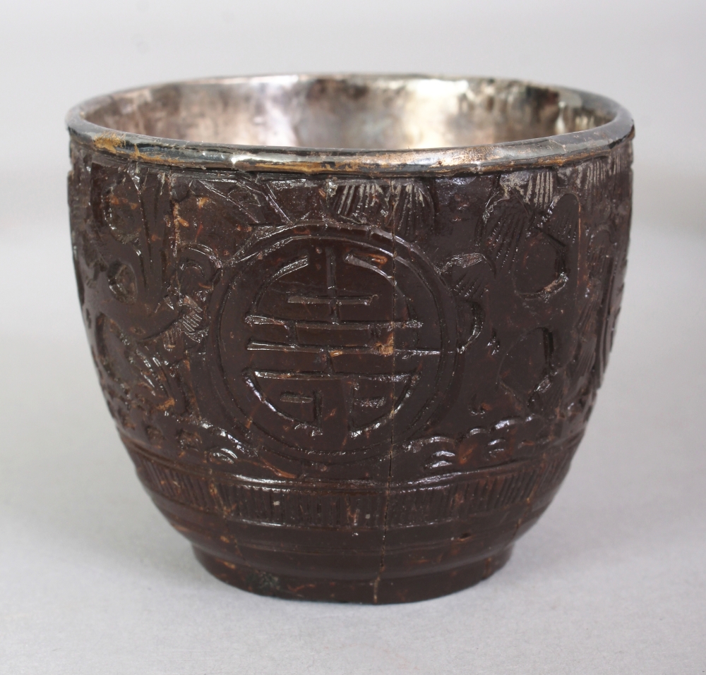 A GROUP OF FIVE 19TH CENTURY CHINESE COCONUT CUPS, with fitted silver liners some bearing an - Image 2 of 10