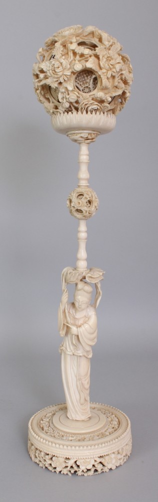 A GOOD LARGE EARLY 20TH CENTURY CHINESE CARVED CONCENTRIC CANTON IVORY BALL ON STAND, the outer