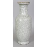 A 19TH CENTURY CHINESE GE STYLE CRACKLEGLAZE PORCELAIN VASE, of ovoid form with a waisted neck, 9.