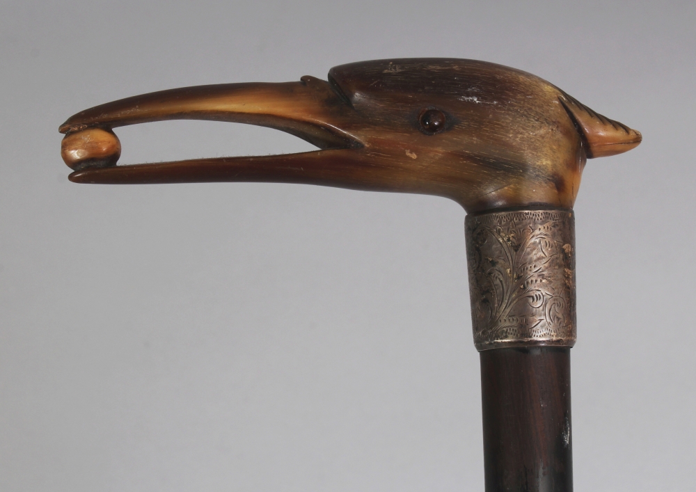 ANOTHER RHINO HORN HANDLED & WOOD WALKING STICK, with a hallmarked and engraved silver collar, the