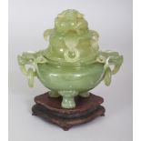 A 20TH CENTURY CHINESE CELADON GREEN JADE-LIKE HARDSTONE CENSER & COVER, together with a fitted wood