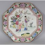 A JAPANESE ENAMELLED OCTAGONAL PORCELAIN DISH, circa 1900, painted in a Chinese style with a scene