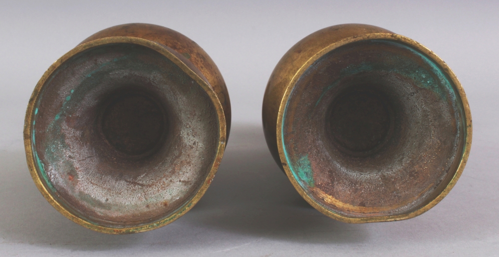 A PAIR OF 18TH CENTURY CHINESE BRONZE VASES, each supported on a high flared foot and with a - Image 4 of 4