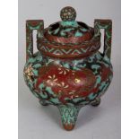 A 19TH/20TH CENTURY JAPANESE CLOISONNE TRIPOD CENSER & COVER, decorated in a Chinese style with
