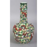 A CHINESE FAMILLE VERTE PORCELAIN BOTTLE VASE, circa 1900, the sides pierced and moulded with the