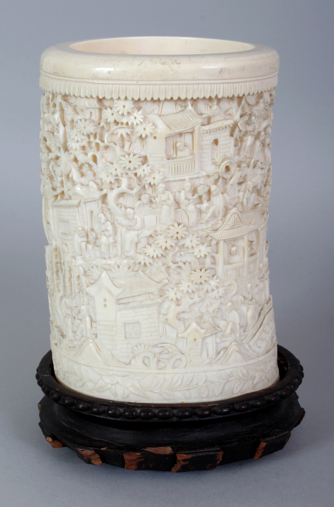 A GOOD LARGE 19TH CENTURY CHINESE CANTON IVORY BRUSHPOT, together with a fixed wood stand, the sides - Image 3 of 7