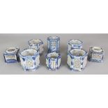 A GROUP OF EIGHT EARLY 20TH CENTURY JAPANESE BLUE & WHITE PORCELAIN INCENSE POTS, of hexagonal
