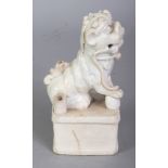 A 17TH/18TH CENTURY CHINESE BLANC-DE-CHINE DEHUA BUDDHISTIC LION JOSS STICK HOLDER, the mythical