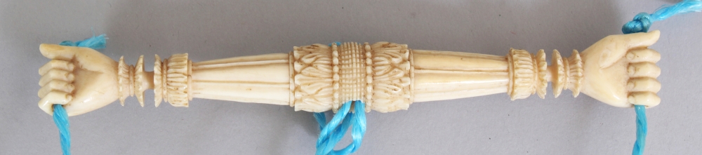 A GOOD QUALITY 19TH CENTURY INDIAN IVORY CARVING, possibly a toy, carved in the form of two linked - Image 2 of 3