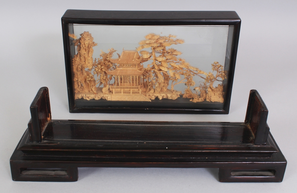 A 20TH CENTURY CHINESE CORK CARVING, in a wood and glass frame supported on a fitted rectangular - Image 7 of 7