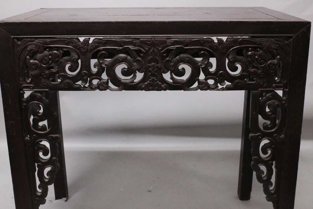 A GOOD 19TH CENTURY CHINESE RECTANGULAR HARDWOOD ALTER TABLE, the pierced frieze carved with - Image 3 of 4