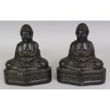 A PAIR OF 20TH CENTURY ORIENTAL BRONZED METAL FIGURES OF BUDDHA, each seated in meditation, 6.1in