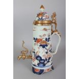 A GOOD JAPANESE EARLY IMARI PORCELAIN CISTERN, circa 1700, with gilded bronze tap, cover and