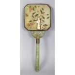 AN EARLY 20TH CENTURY CHINESE ONLAID JADE HAND MIRROR, its reverse onlaid in ivory, mother-of-pearl,
