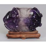 A 20TH CENTURY CHINESE AMETHYST GU VASE, together with a fitted wood stand, the vase of archaic form