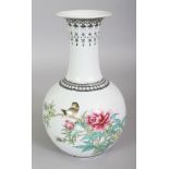 A 20TH CENTURY CHINESE FAMILLE ROSE PORCELAIN BOTTLE VASE, painted with a bird perched on a