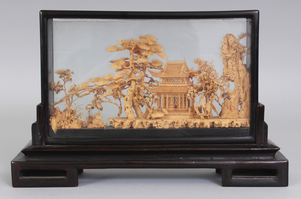 A 20TH CENTURY CHINESE CORK CARVING, in a wood and glass frame supported on a fitted rectangular - Image 3 of 7