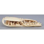 AN EARLY 20TH CENTURY ORIENTAL DOUBLE CLAM'S DREAM IVORY CARVING, the interiors pierced and carved