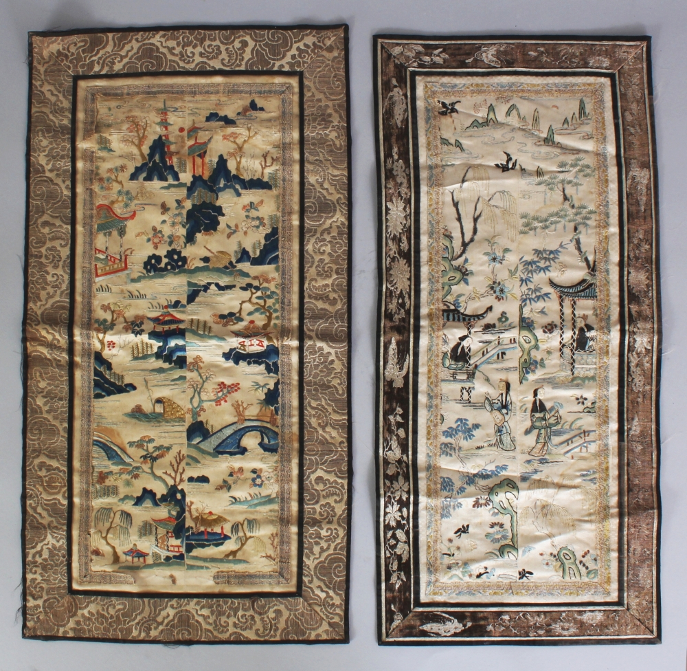 TWO EARLY 20TH CENTURY CHINESE EMBROIDERED SILK PANELS, each containing two sleeve panels within a