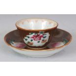 AN EARLY/MID 18TH CENTURY CHINESE BATAVIAN FAMILLE ROSE PORCELAIN TEABOWL & SAUCER, each piece