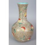 AN EARLY 20TH CENTURY CHINESE FAMILLE ROSE PORCELAIN VASE, painted with scrolling peach reserved