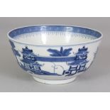 A 20TH CENTURY CHINESE BLUE & WHITE PORCELAIN BOWL, decorated in a 19th Century style with buildings