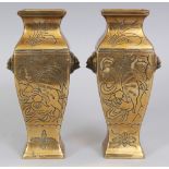 A PAIR OF EARLY 20TH CENTURY CHINESE SQUARE SECTION POLISHED BRONZE VASES, each vase incised with