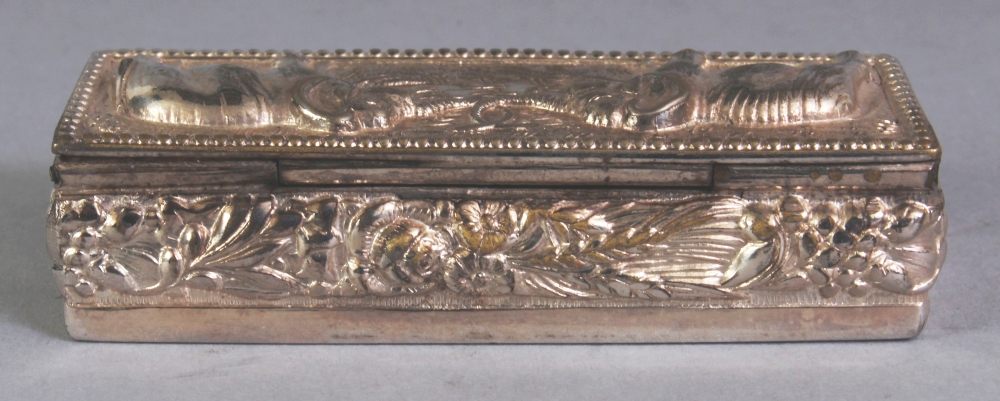 A SOUTH-EAST ASIAN SILVER-METAL RECTANGULAR PILL BOX, weighing approx. 29gm, the cover embossed with - Image 3 of 8