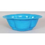 A CHINESE BEIJING BLUE GLASS BOWL, of lobed quatrefoil form with a flanged rim, 11.5in x 8.25in x
