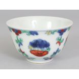 A CHINESE MING STYLE DOUCAI PORCELAIN TEABOWL, the sides decorated with repeated double ruyi motifs,