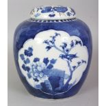 A 19TH CENTURY CHINESE BLUE & WHITE PORCELAIN JAR, and non-matching cover, the sides painted with
