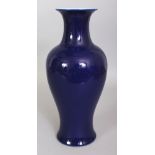 A CHINESE BLUE GLAZED VASE, of baluster form, the base with a Daoguang seal mark, 11.75in high.