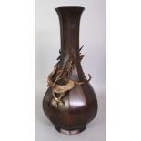 AN EARLY 20TH CENTURY JAPANESE BRONZE DRAGON VASE, of decagonal section, the sides applied in high