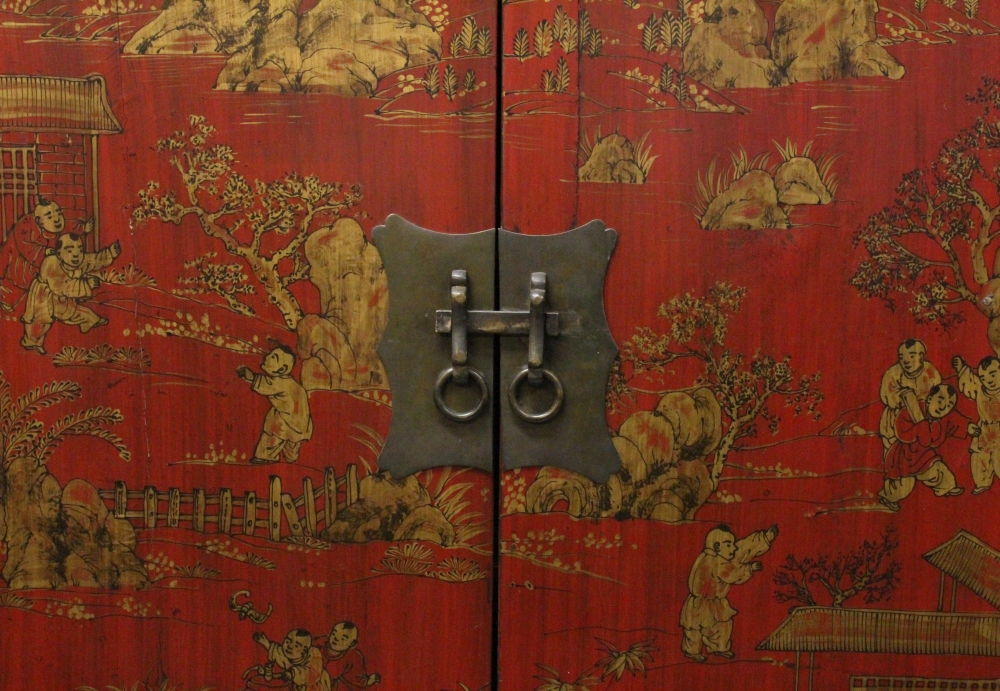 A LARGE EARLY 20TH CENTURY CHINESE RED GROUND LACQUERED WOOD CABINET, with two hinged front doors - Image 3 of 6