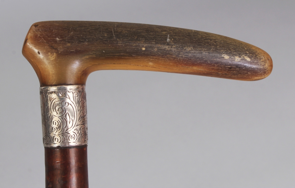 A RHINO HORN HANDLED & KNARLED WOOD WALKING STICK, with a hallmarked and engraved silver collar, the - Image 3 of 4