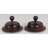 A PAIR OF CHINESE PIERCED HARDWOOD VASE COVERS, to fit vases with neck rims no smaller than 2.