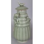 A 20TH CENTURY CHINESE SOUTHERN SONG STYLE LONGQUAN PORCELAIN FUNERARY JAR & COVER, the ribbed
