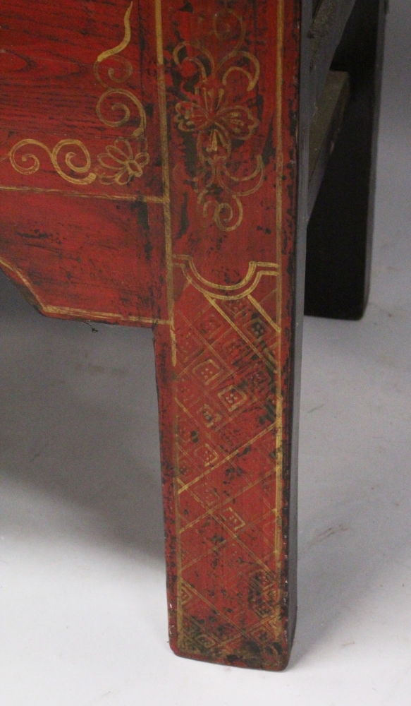 A LARGE EARLY 20TH CENTURY CHINESE RED GROUND LACQUERED WOOD CABINET, with two hinged front doors - Image 6 of 6