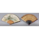 TWO EARLY 20TH CENTURY JAPANESE PAINTED PAPER FANS, one fan with lacquered guard sticks and