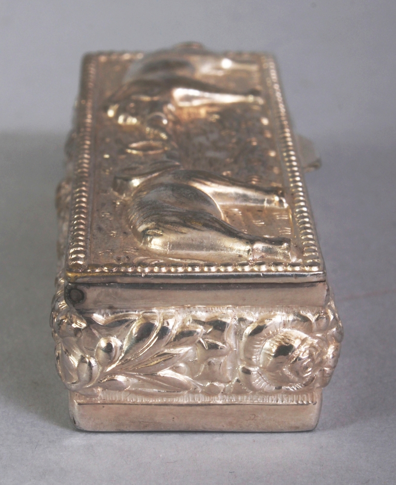 A SOUTH-EAST ASIAN SILVER-METAL RECTANGULAR PILL BOX, weighing approx. 29gm, the cover embossed with - Image 2 of 8