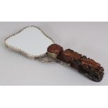 A CHINESE JADE HANDLED SILVER-METAL HAND MIRROR, the handle of traditional belt hook form, the stone